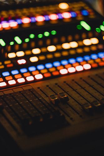 shallow focus photography of audio mixer